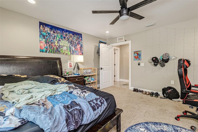 carpeted bedroom featuring ceiling fan