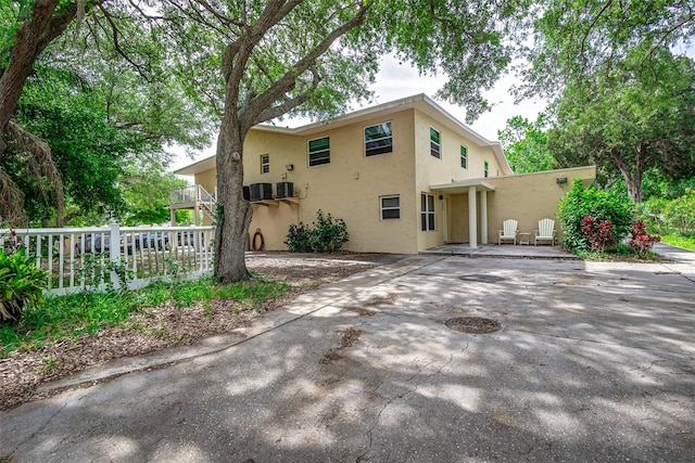 view of front of house with a patio area