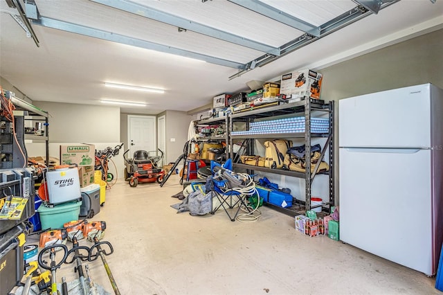 garage featuring white refrigerator