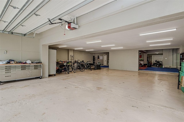 garage featuring a garage door opener