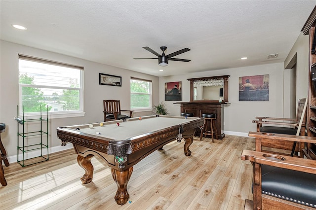 recreation room with ceiling fan, light hardwood / wood-style flooring, a healthy amount of sunlight, and pool table