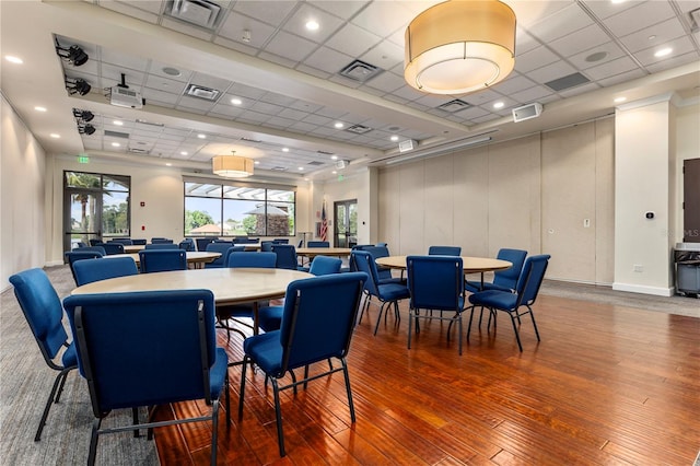 dining room featuring a paneled ceiling, french doors, and dark hardwood / wood-style flooring