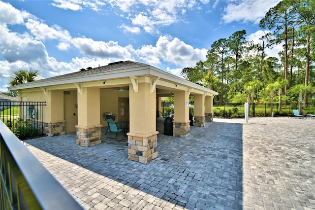 surrounding community with a patio area and a gazebo