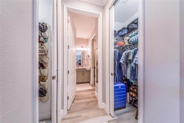 hallway featuring light hardwood / wood-style flooring