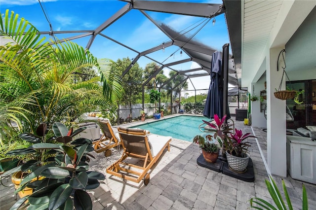 view of pool featuring a patio and a lanai