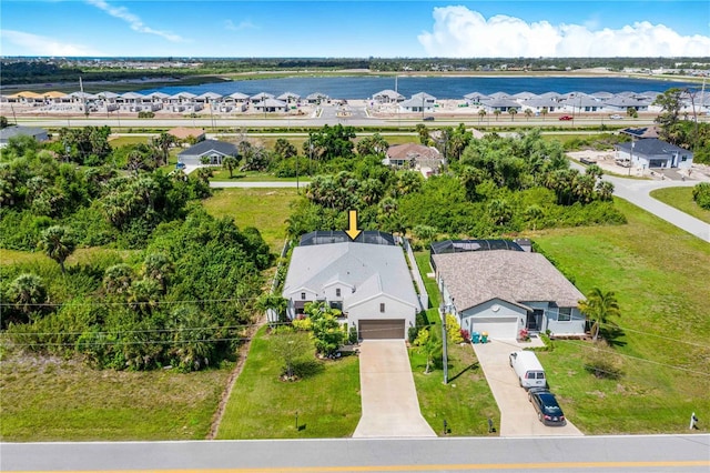 bird's eye view with a water view