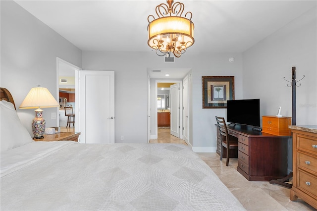 tiled bedroom featuring an inviting chandelier