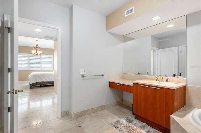 bathroom with tile floors and vanity with extensive cabinet space