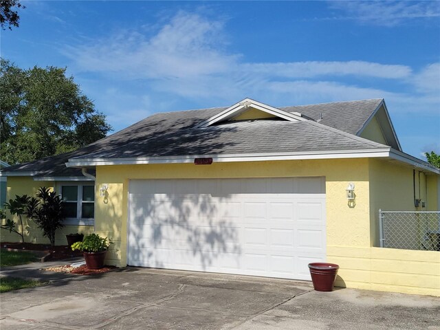 single story home with a garage