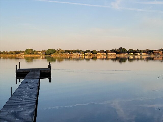 view of dock with a water view