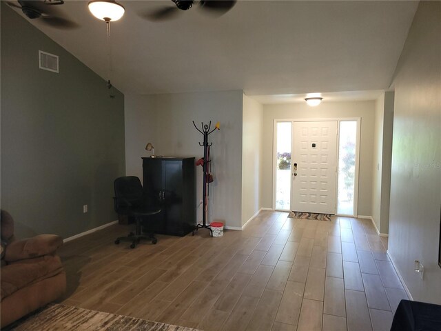 foyer with light hardwood / wood-style floors