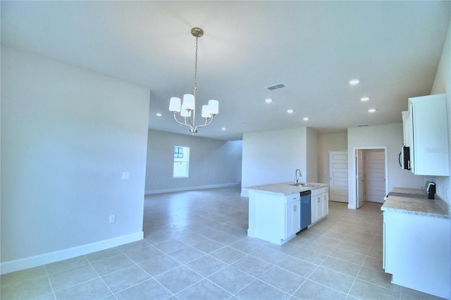 kitchen featuring sink, stainless steel appliances, white cabinets, a chandelier, and pendant lighting