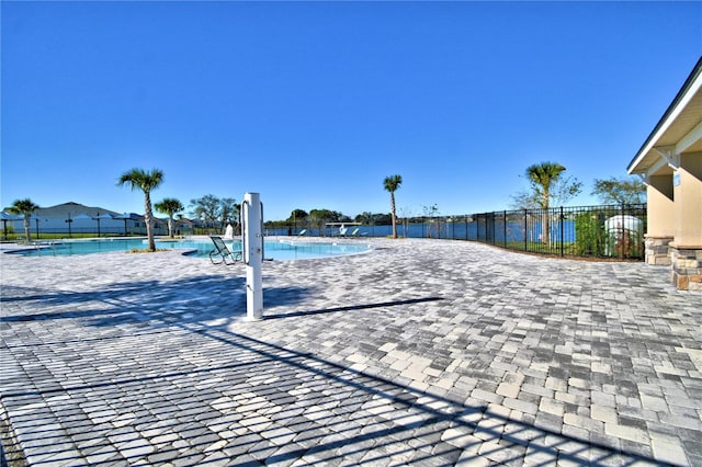 view of nearby features with a patio area and a pool