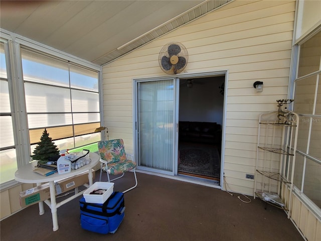 sunroom featuring lofted ceiling