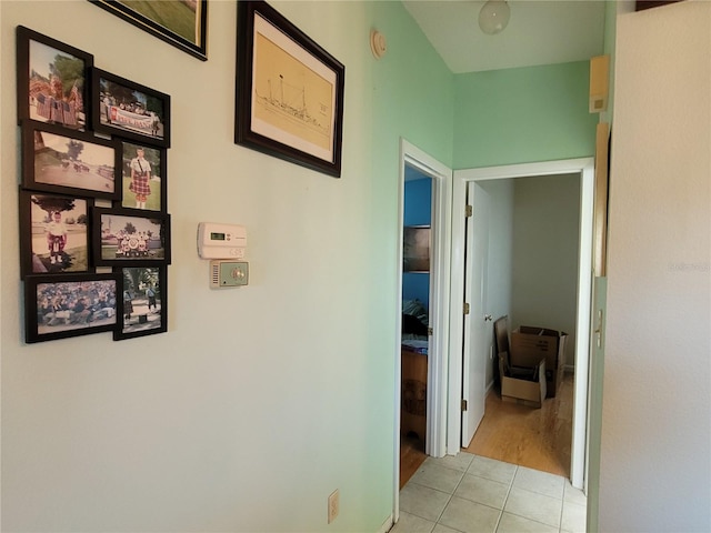 corridor with light tile flooring