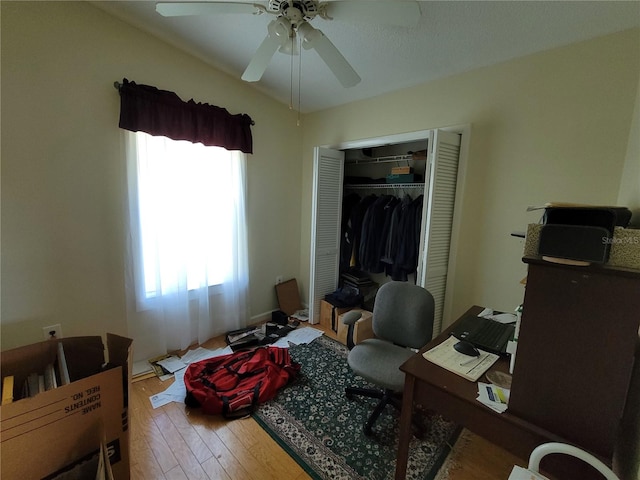 home office featuring ceiling fan and wood-type flooring