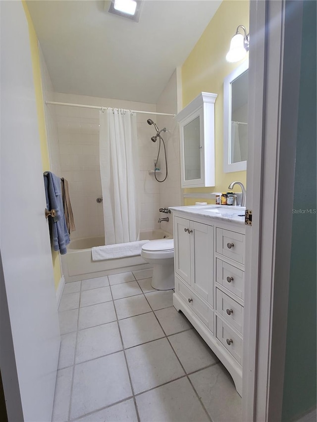 full bathroom featuring tile flooring, shower / bath combination with curtain, toilet, and vanity