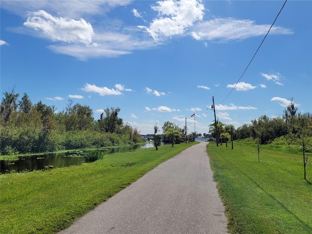 view of street featuring a water view