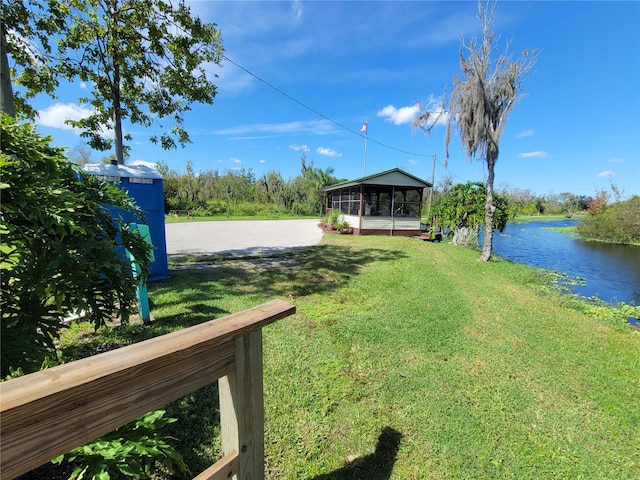 view of yard with a water view