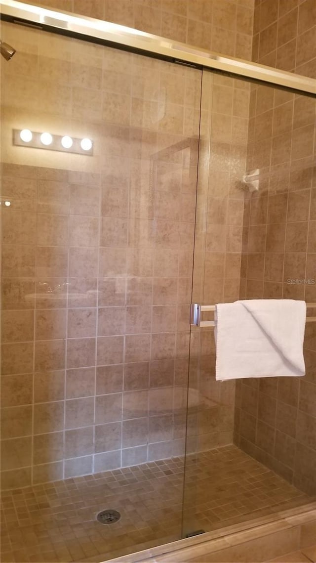 bathroom with an enclosed shower