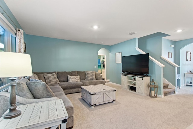 living room featuring light colored carpet