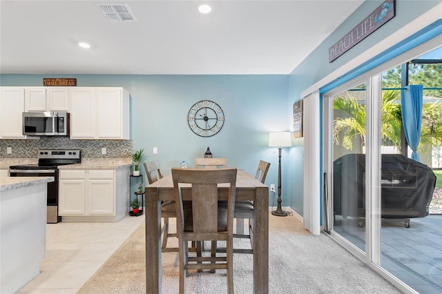 view of tiled dining space