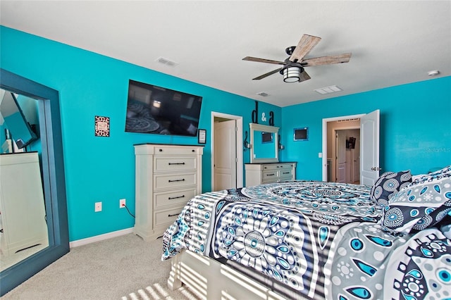 carpeted bedroom with ceiling fan