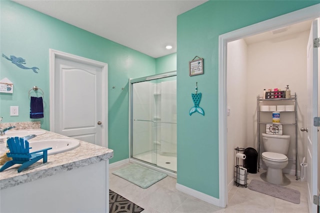 bathroom with tile patterned floors, vanity, toilet, and a shower with shower door