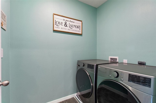 clothes washing area featuring independent washer and dryer