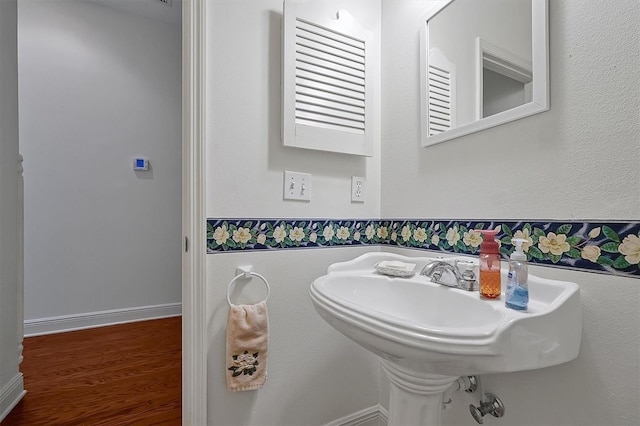 bathroom featuring hardwood / wood-style floors