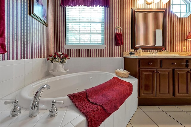 bathroom with tile flooring, a bathing tub, and oversized vanity