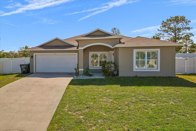 single story home with a garage and a front lawn