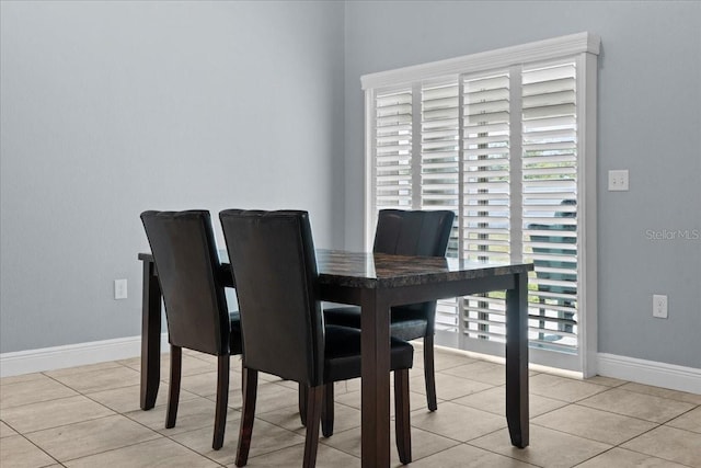 dining room featuring light tile flooring