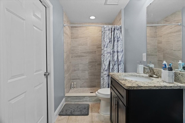 bathroom featuring a shower with shower curtain, toilet, tile floors, and large vanity