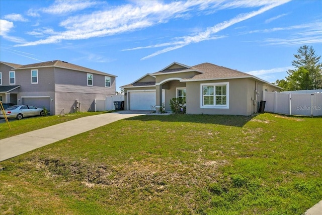 ranch-style home featuring a garage and a front lawn