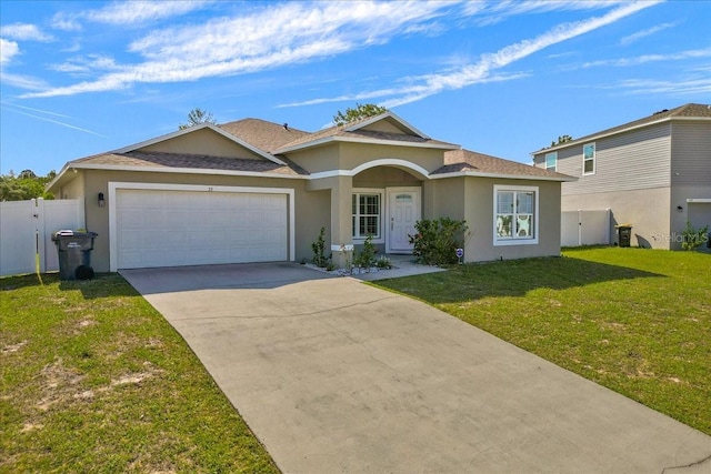 ranch-style home with a front lawn and a garage