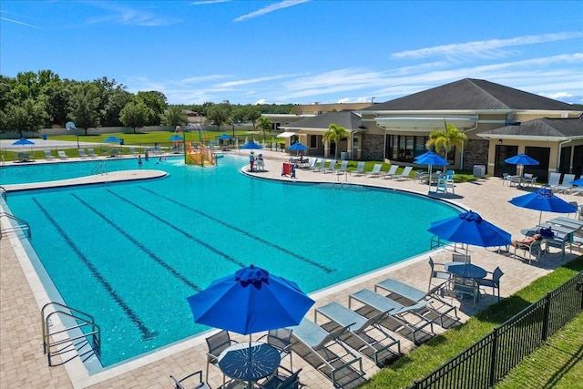 view of pool featuring a patio