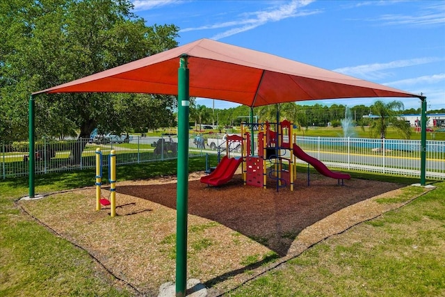 view of play area featuring a lawn