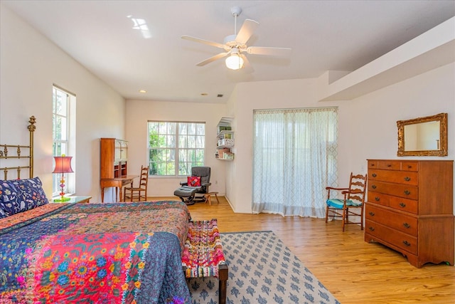 bedroom featuring light hardwood / wood-style flooring and ceiling fan