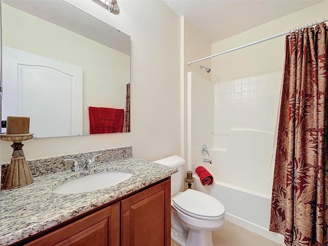 full bathroom featuring toilet, tile flooring, shower / tub combo with curtain, a textured ceiling, and vanity