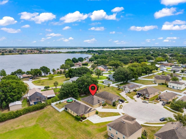 drone / aerial view with a water view