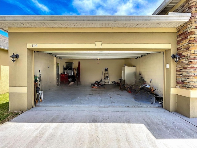 garage featuring white refrigerator