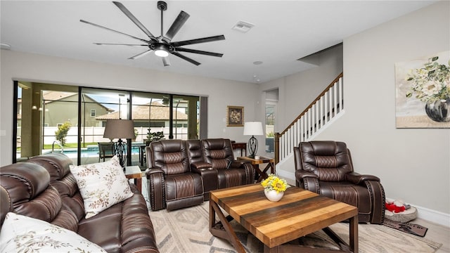 living room featuring ceiling fan