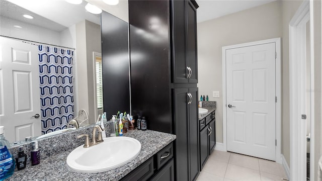 bathroom featuring vanity and tile patterned floors