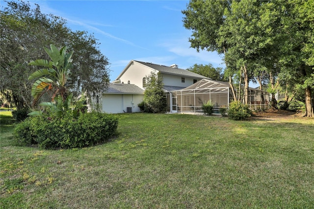 view of yard featuring a lanai