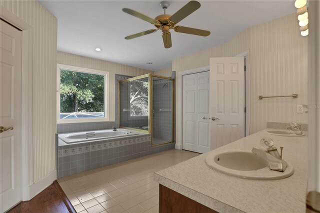 bathroom with independent shower and bath, ceiling fan, tile patterned floors, and vanity