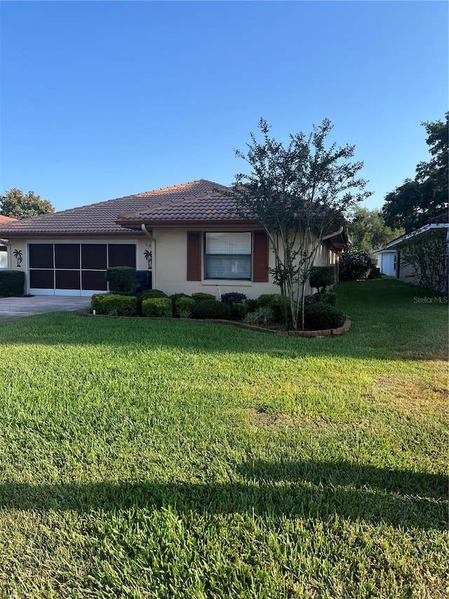 ranch-style house with a front lawn