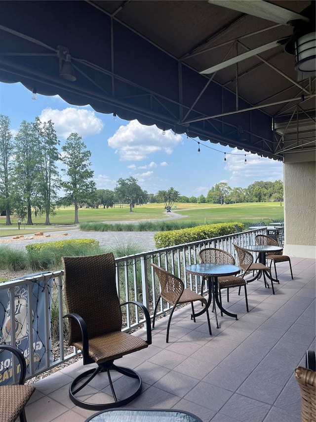 view of patio with a water view