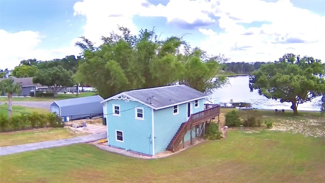 exterior space with a water view