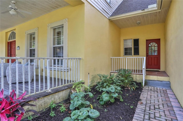 8608 Poinsettia Dr, Temple Terrace, FL 33637 - doorway to property featuring covered porch and ceiling fan